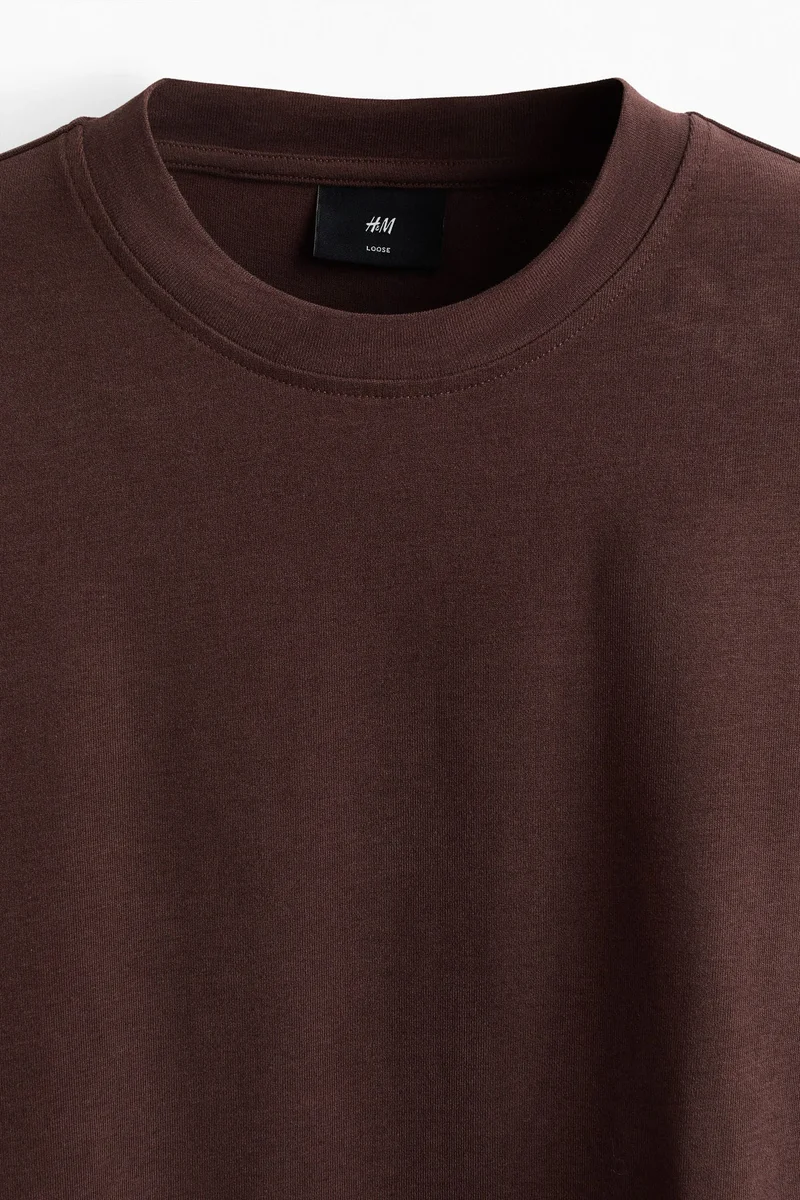 اتش اند ام تي-شيرت بقصة واسعة وتصميم بوكسي